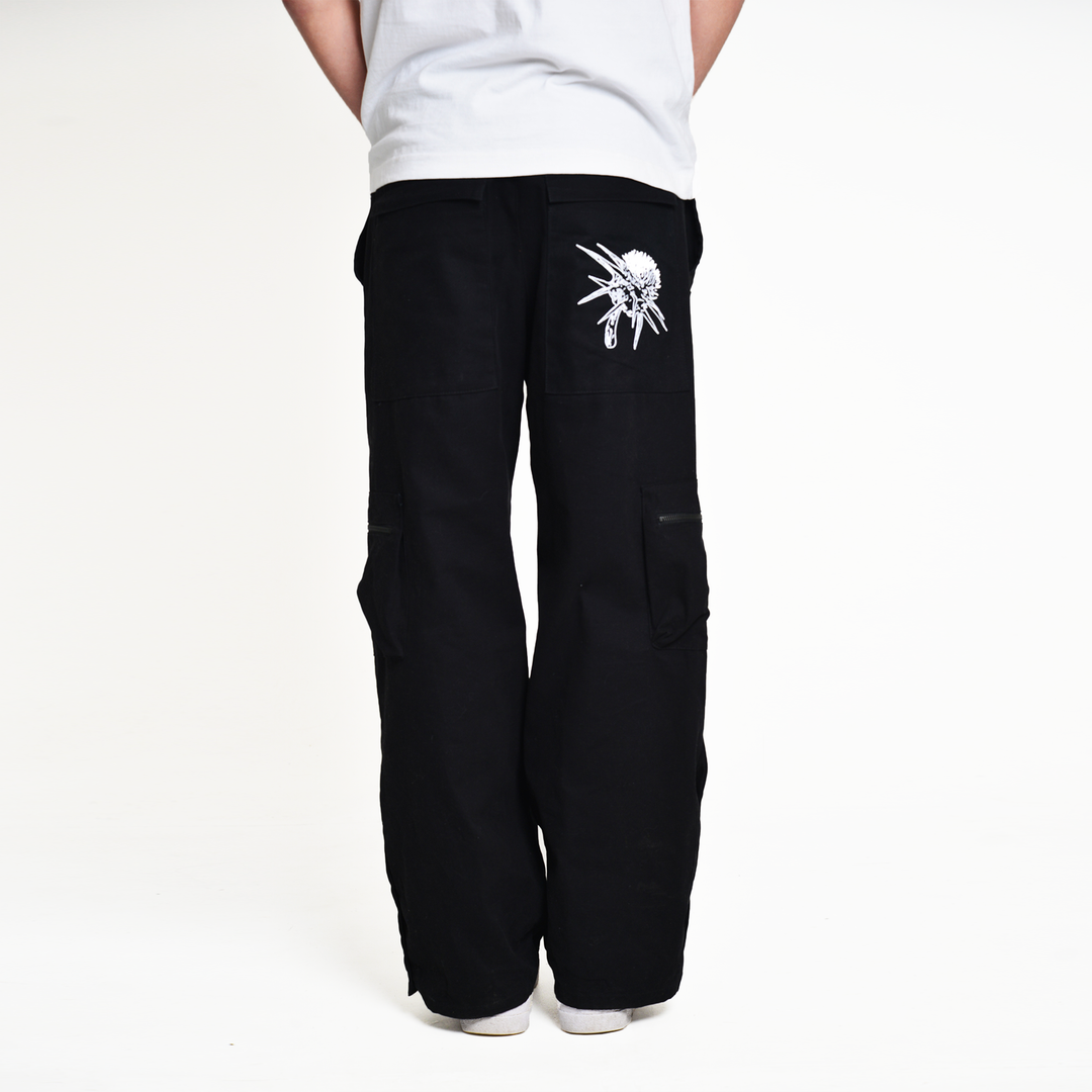 Black pants hot sale with cuts